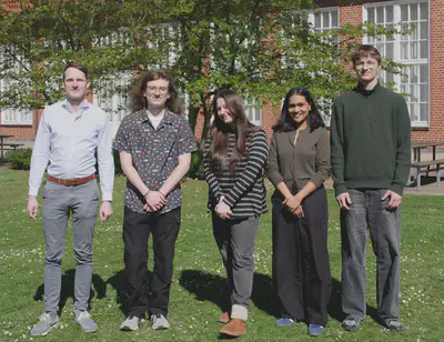 *Biomolecular Systems and Design Lab, Bremen, 2026. From left to right: Torsten John (PI), Carson Kitt (Bachelor Student), Natasza Hantulska (Technical Assistant), Aiswarya Rajeev (PhD Student), Friedrich Matteo Lüderitz (Bachelor Student/TA).*